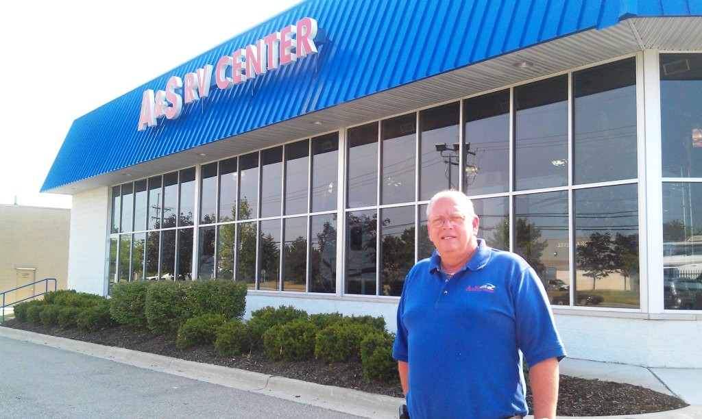 A & S RV Center President Larry Andree stands in front of his business