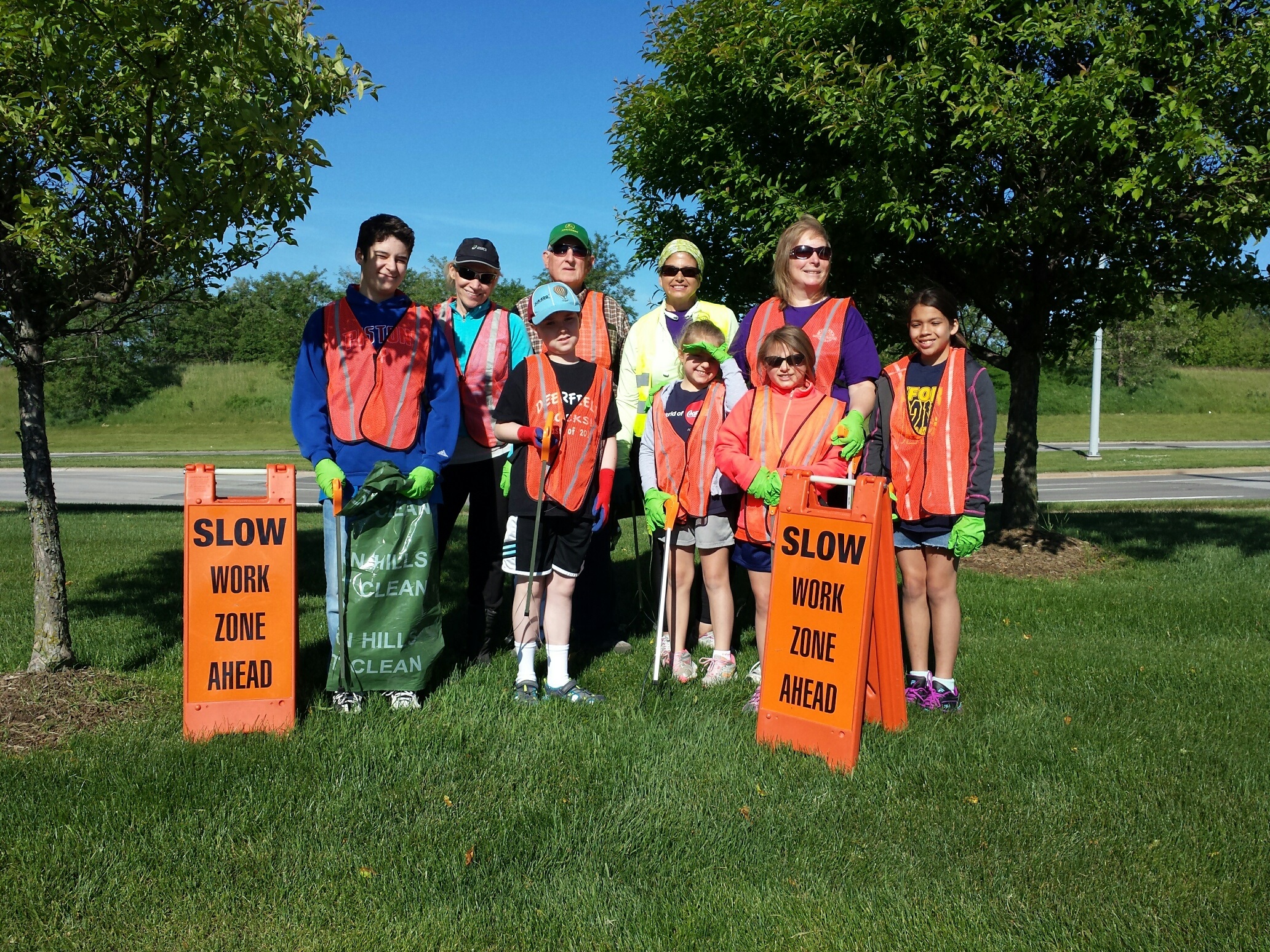 Student volunteers, from left to right, Owen, 15 from Eton Academy; Carl, 11 from Deerfield Elementary;  Chloe....