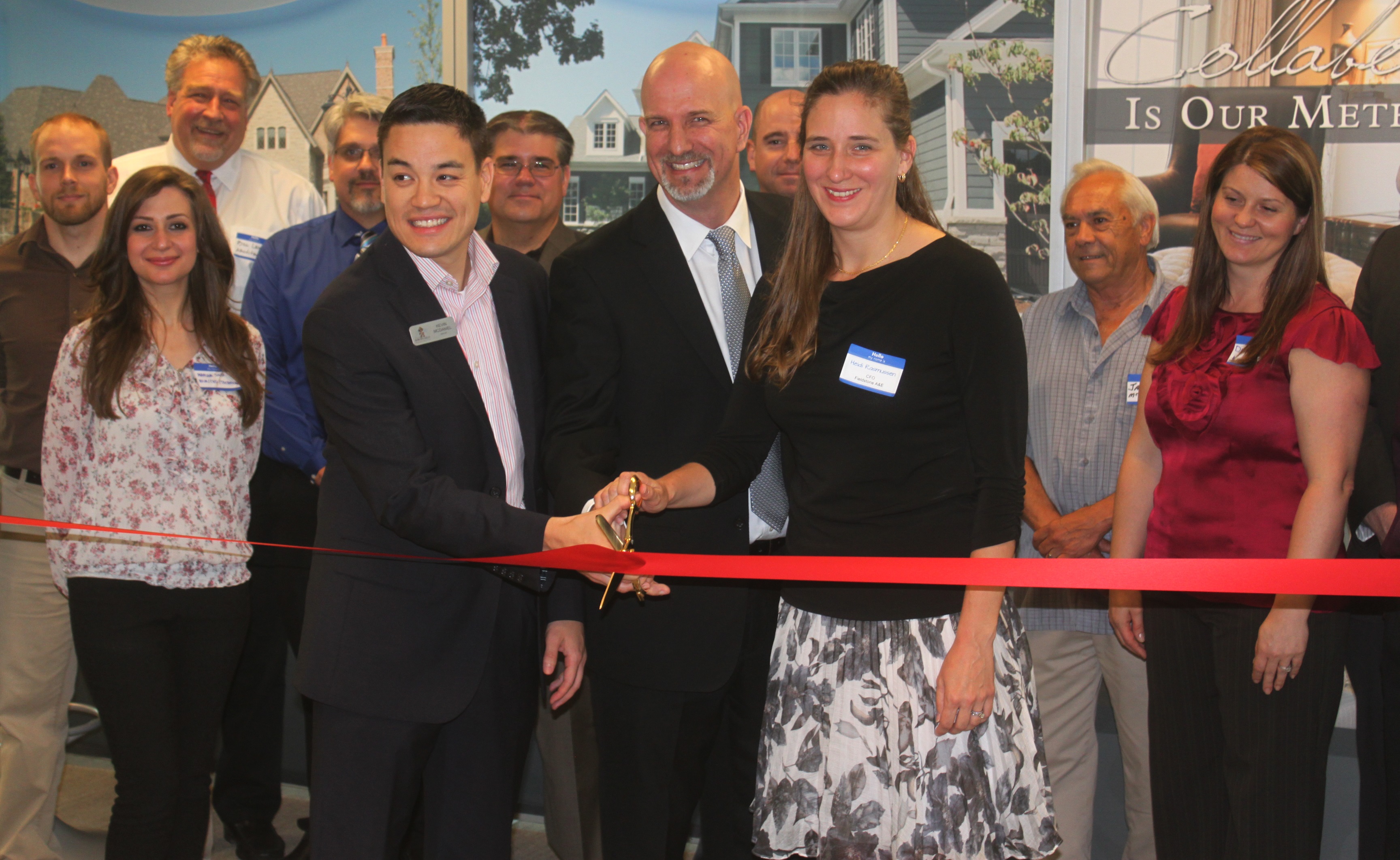 Mayor, Kevin McDaniel with   President and CEO, Ryan Rasmussen and CFO, Heidi Rasmussen