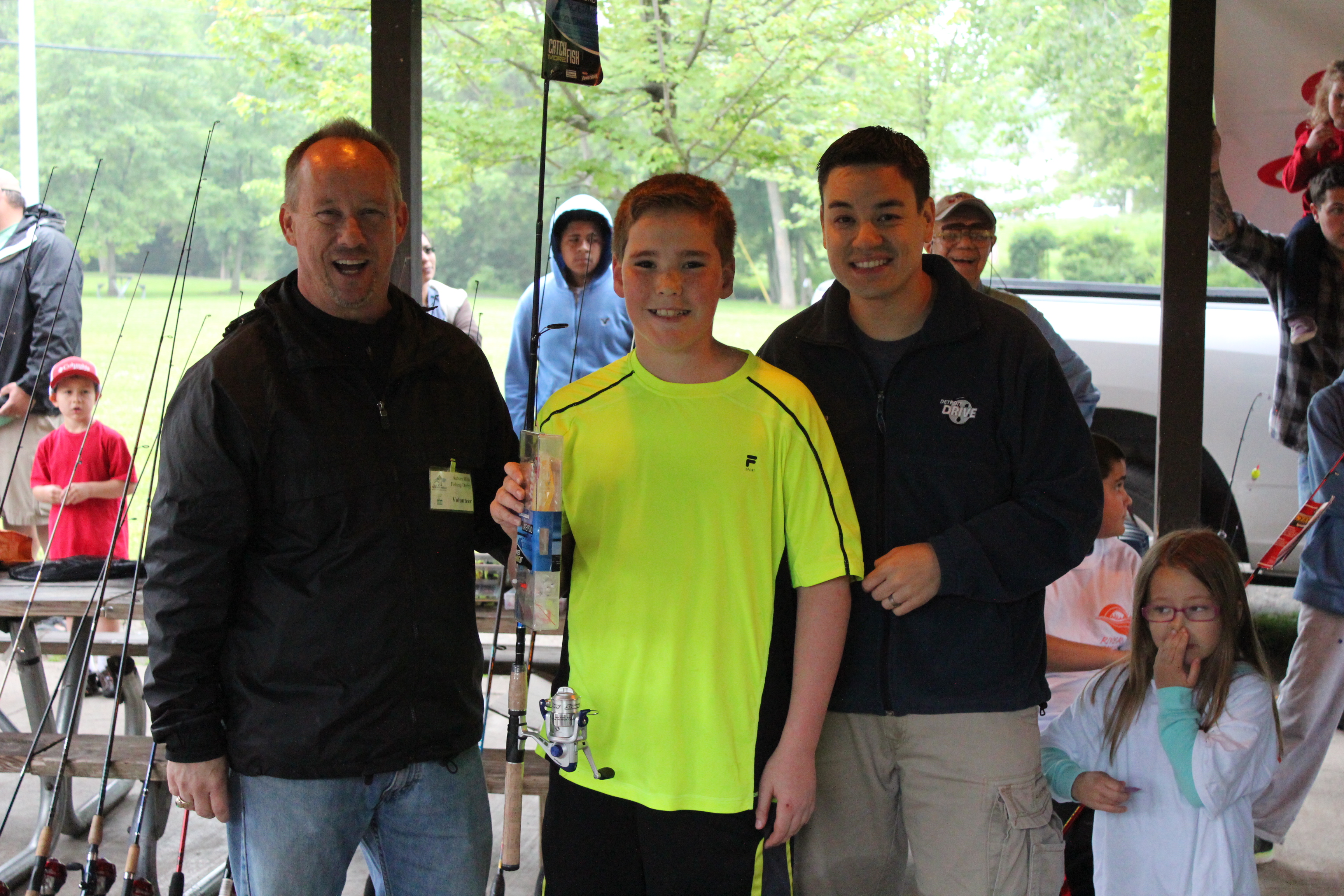 Mayor, Kevin McDaniel and  Parks & Rec Director, Brian Marzolf with one of the lucky raffle winners. 